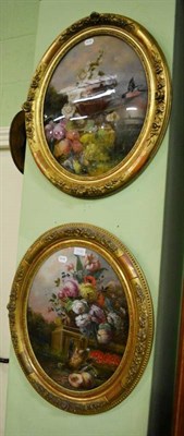 Lot 1190 - A pair of reverse painted oval still life subjects, in gilt frames