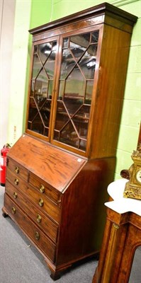 Lot 1200 - Georgian mahogany bureau bookcase with inlaid decoration and astragal glazed doors