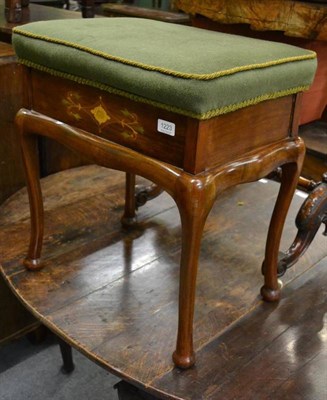 Lot 1223 - A walnut piano seat with inlaid decoration and hinged cover