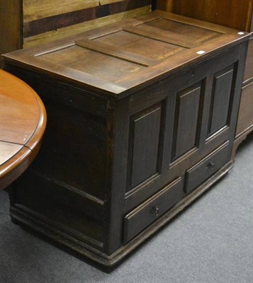 Lot 1225 - A 19th century oak panel coffer with two drawers below