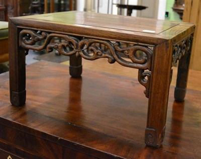 Lot 1230 - A Chinese hardwood low table