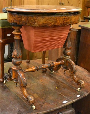 Lot 1232 - A Victorian walnut sewing table