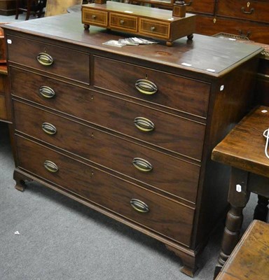 Lot 1241 - A Georgian mahogany four height chest of drawers