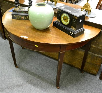 Lot 1255 - A mahogany D-shaped table