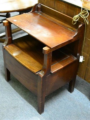 Lot 1256 - A 19th century mahogany commode chair