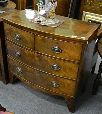 Lot 1258 - Georgian mahogany three height bow front chest of drawers