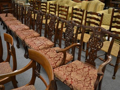 Lot 1283 - A set of eight George III style dining chairs including two carvers