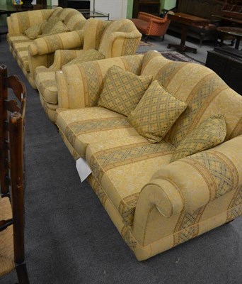 Lot 1285 - A Lincoln House modern three piece suite, comprising: a pair of sofas and a wingback chair