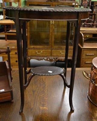 Lot 1295 - An Edwardian oval two tier occasional table