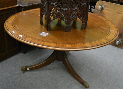 Lot 1299 - A breakfast table on tripod base with satinwood and ebony inlay