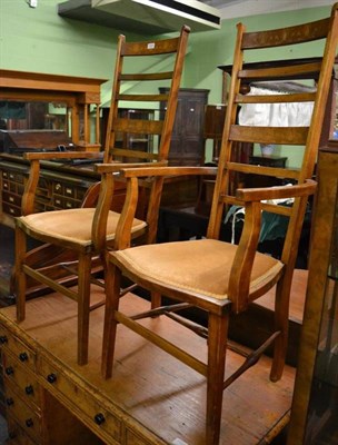 Lot 1303 - A pair of Art Nouveau ladder back armchairs, in the Liberty & Co. style, 118.5cm