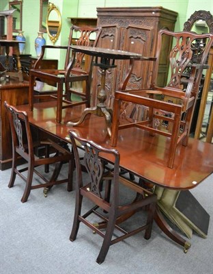 Lot 1309 - A reproduction mahogany twin pedestal dining table, a set of six chairs and a sideboard