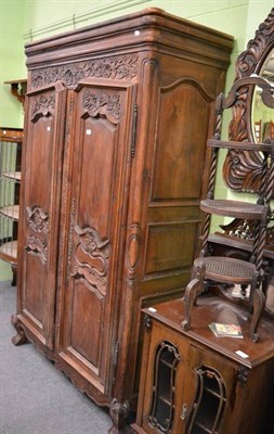 Lot 1320 - A French oak armoire