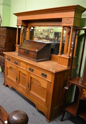 Lot 1329 - A large late 19th century light oak mirrored back sideboard with Art Nouveau motifs and...