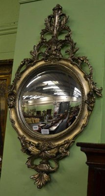 Lot 1332 - A pair of modern decorative silvered convex wall mirrors