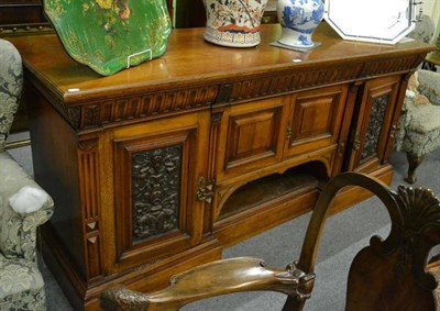 Lot 1336 - A large Victorian sideboard with carved detailing