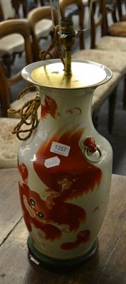 Lot 1357 - A 19th century Chinese table lamp decorated with dogs of fo, with shade (undrilled)