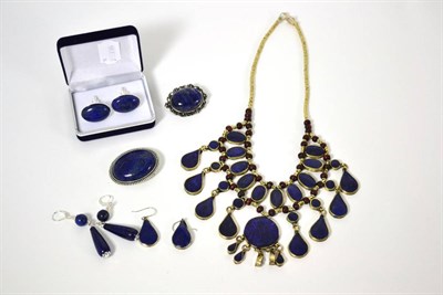 Lot 5 - A group of lapiz lazuli type jewellery including a cabochon brooch together with a pair of drop...