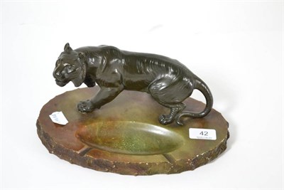 Lot 42 - A Japanese Meiji style tiger, mounted on an alabaster ashtray base