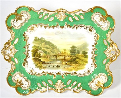 Lot 69 - An early 19th century porcelain dish, part gilt and painted with a scene titled verso ";View...