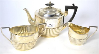Lot 90 - A Walker & Hall silver three piece tea service