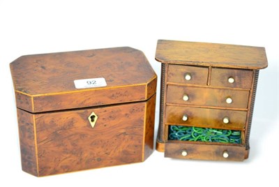 Lot 92 - A 19th century burr yew wood tea caddy and a miniature chest (2)