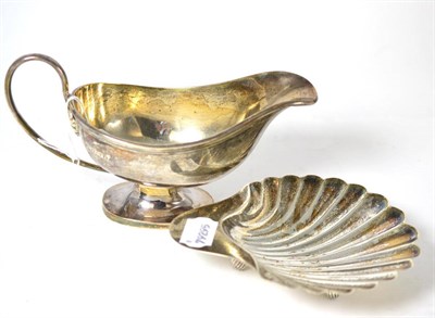 Lot 99 - A silver sauce boat and a silver shell shaped dish (2)