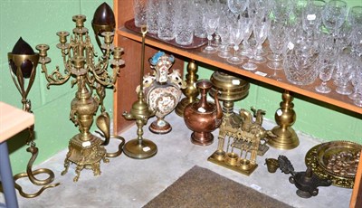 Lot 110 - A group of Middle Eastern and European copper and brass including pricket sticks, candelabra,...