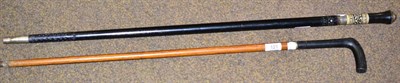 Lot 121 - An early 20th century sword stick and a Victorian malacca sword stick (2)