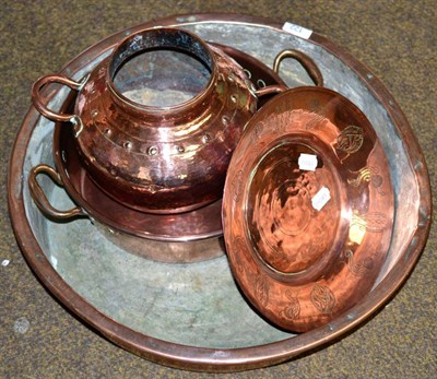 Lot 122 - A large copper bowl and three other items of copper (4)