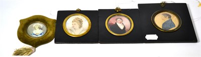 Lot 158 - Three 19th century portrait miniatures in ebonised frames and another in shaped velvet frame
