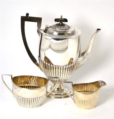 Lot 162 - Walker & Hall silver coffee pot, Sheffield 1900, a sugar bowl and milk jug, Sheffield 1923
