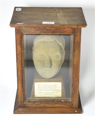 Lot 163 - An English medieval carved stone head of a cleric, circa 14th century, carved almost in the...
