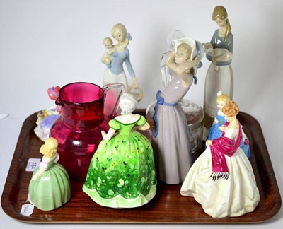 Lot 164 - Two Lladro figure groups, Royal Doulton figures, cranberry glass jug etc