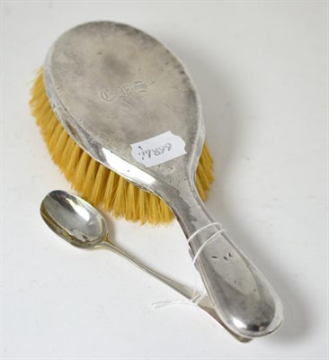 Lot 204 - A silver-backed hairbrush, Chester hallmark, together with a Georgian silver teaspoon (2)