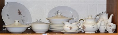 Lot 214 - A Royal Doulton Tumbling Leaves pattern dinner/tea service for six place settings including teapot