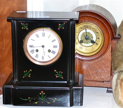 Lot 218 - A black slate mantel clock and an oak mantel clock