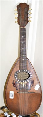 Lot 222 - A 19th century mandolin inlaid with tortoiseshell in the form of a butterfly