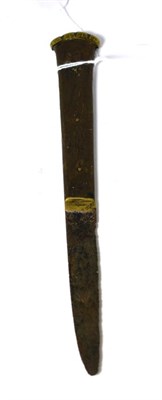 Lot 239 - A Tudor iron dagger with brass mounted wooden handle, circa 1500-1600 AD, length 20cm