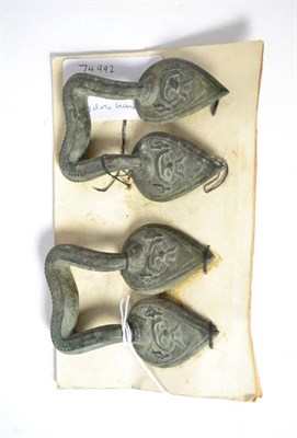 Lot 249 - A pair of Roman bronze hydria handles, circa 100 BC-100 AD, each handle shaped and with cast...