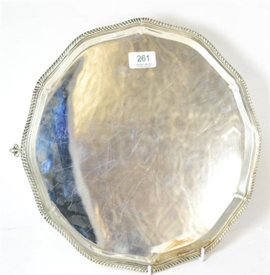 Lot 261 - A Roberts & Belk silver salver, raised on tree ball and claw feet, Sheffield 1945