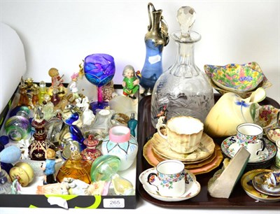 Lot 265 - Two trays of decorative ceramics and glass including scent bottles paperweights, mallet...