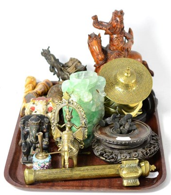 Lot 271 - A group of Indian and Oriental reproduction objects including figures, vessels and carvings (on two