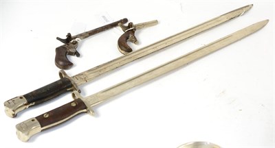 Lot 291 - Two 1907 pattern bayonets, lack scabbards and two blank firing pistols