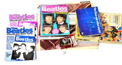 Lot 297 - Beatles records and magazines, tea cards and Petie miniature camera