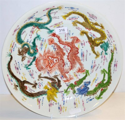 Lot 316 - A 20th century Chinese polychrome decorated charger