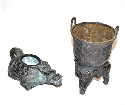 Lot 317 - A bronzed vase on three elephant feet and a water dropper (2)