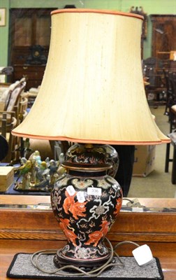 Lot 336 - A Chinese famille noir ginger jar and cover mounted as a lamp