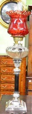 Lot 341 - An Edwardian plated and ebony corinthian pillar oil lamp