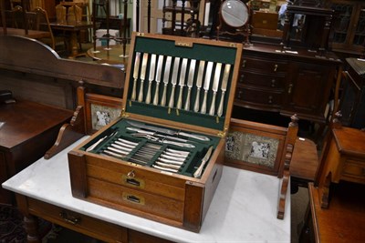 Lot 349 - A late Victorian/Edwardian silver plated table service of Albany pattern in a blond oak canteen